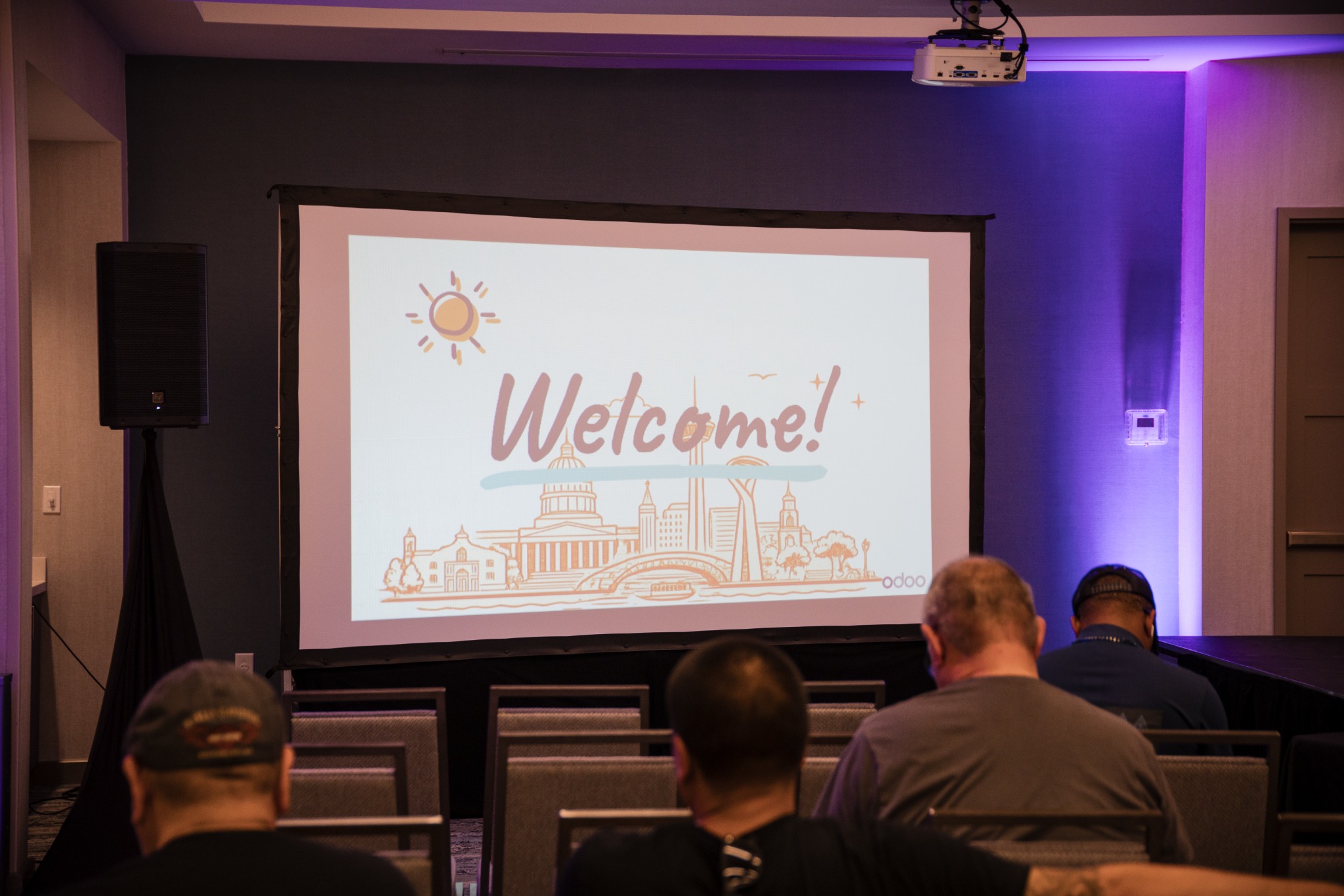 Guests attending the welcome presentation