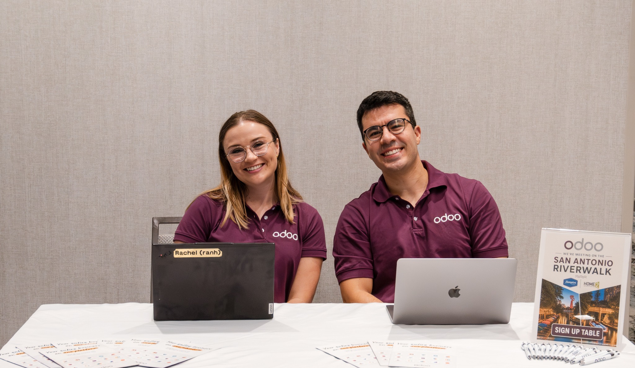 Odoo team greeting attendees at registration