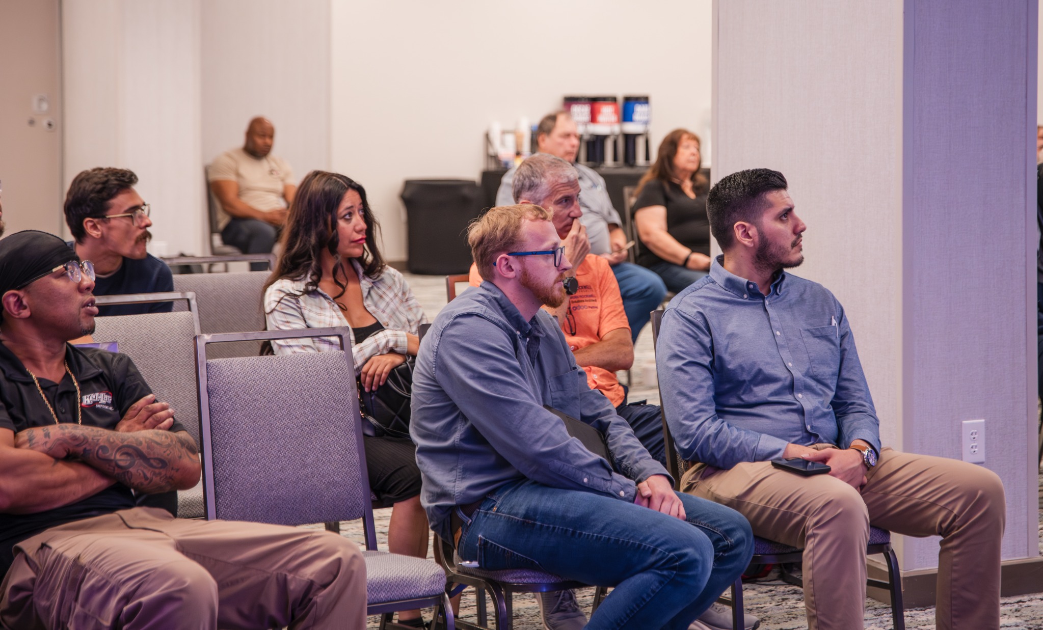 Audience watching the Odoo presentation