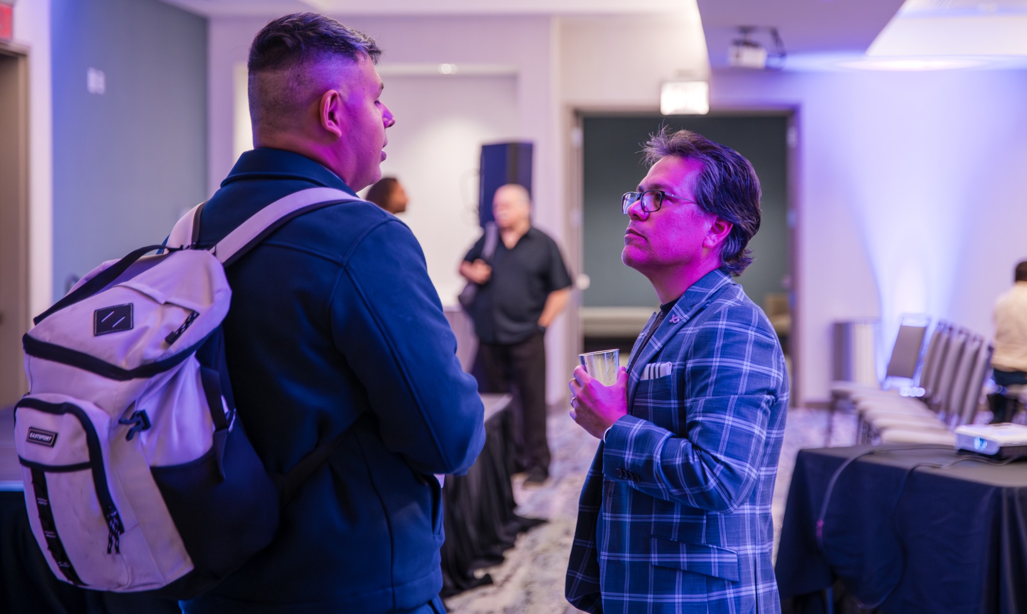 Professionals networking during a San Antonio corporate event photographed by Axis Visual Productions