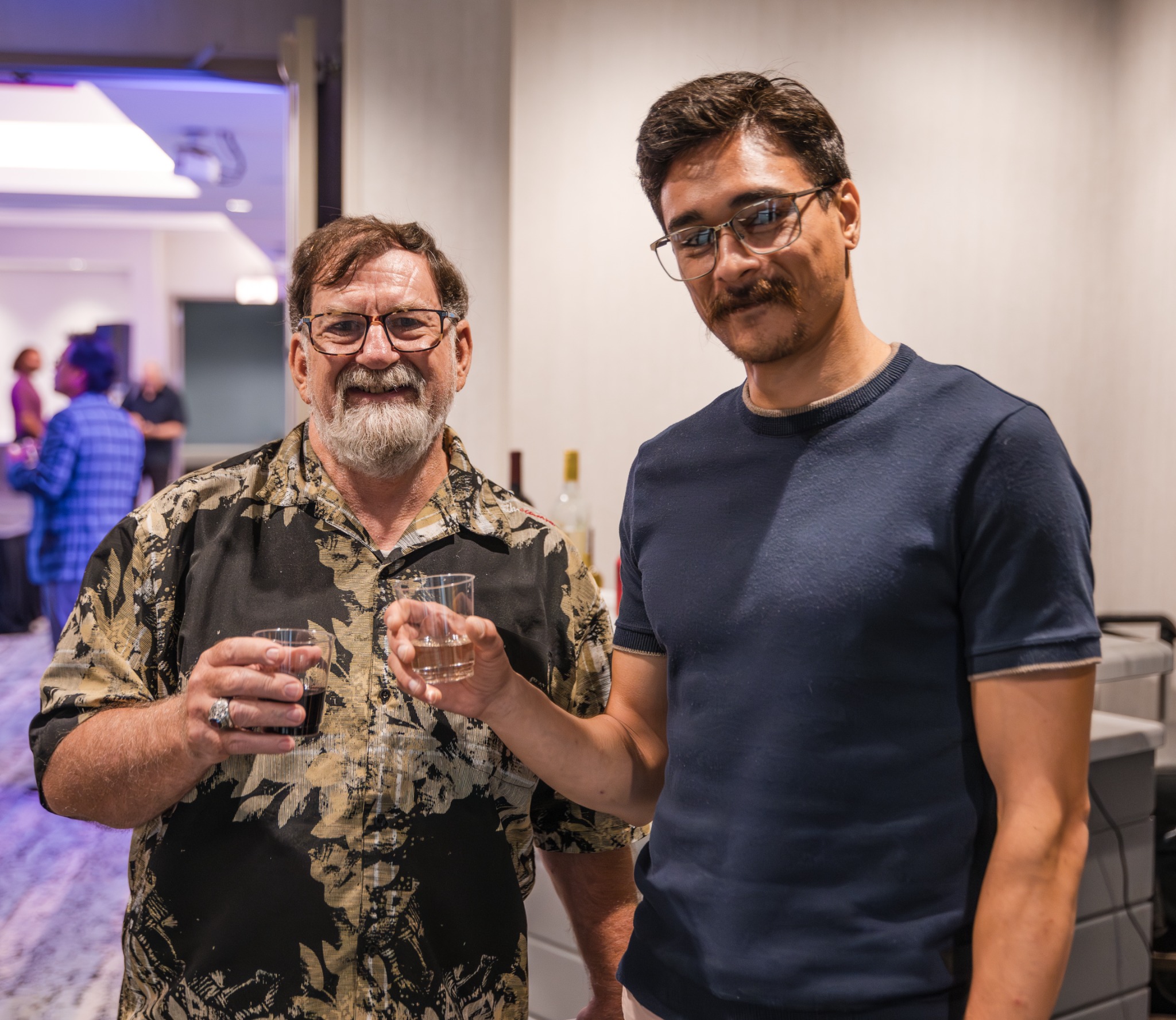 Two guests posing together during the event