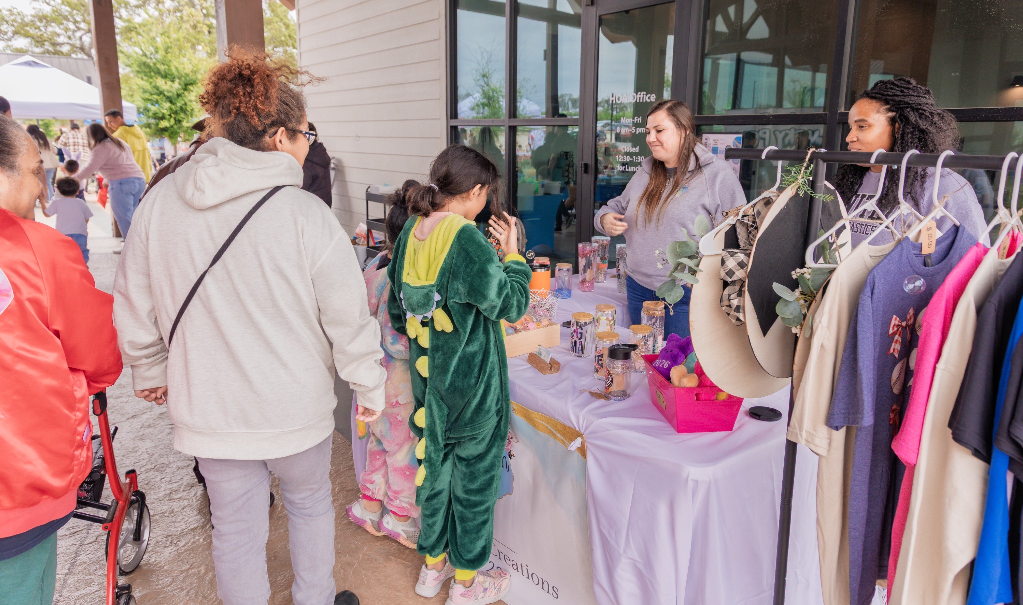 Guests browsing merchandise at vendor tables