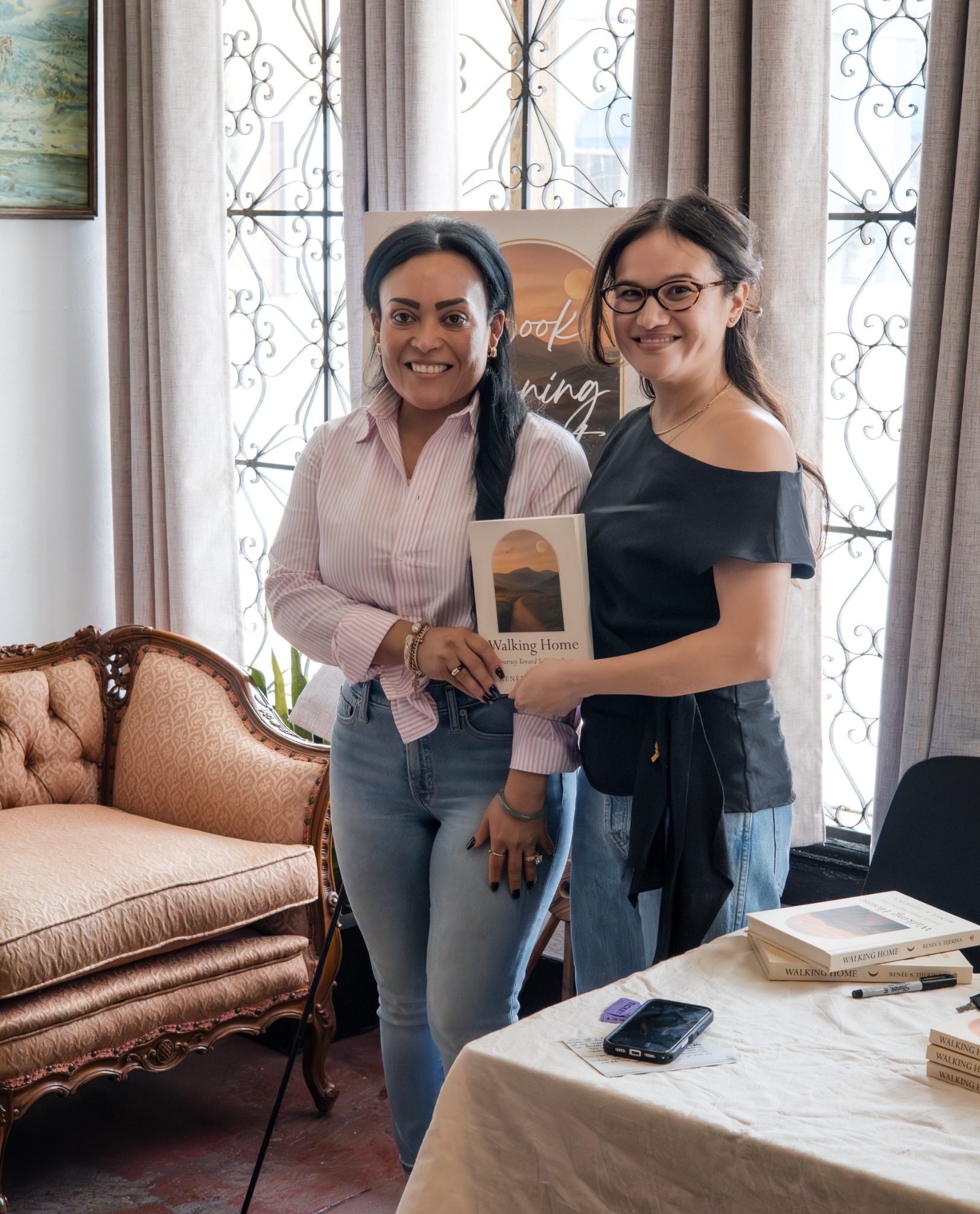 Renée S. Tijerina posing with an attendee