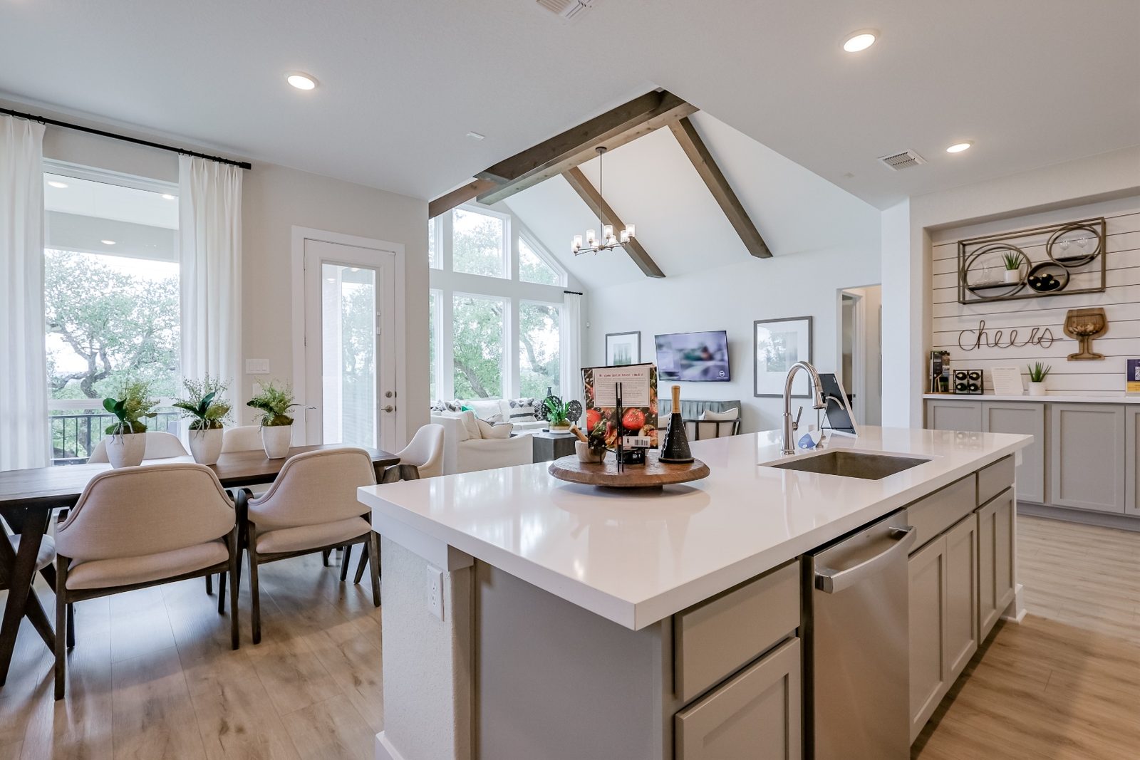 Open kitchen and dining space with vaulted ceiling