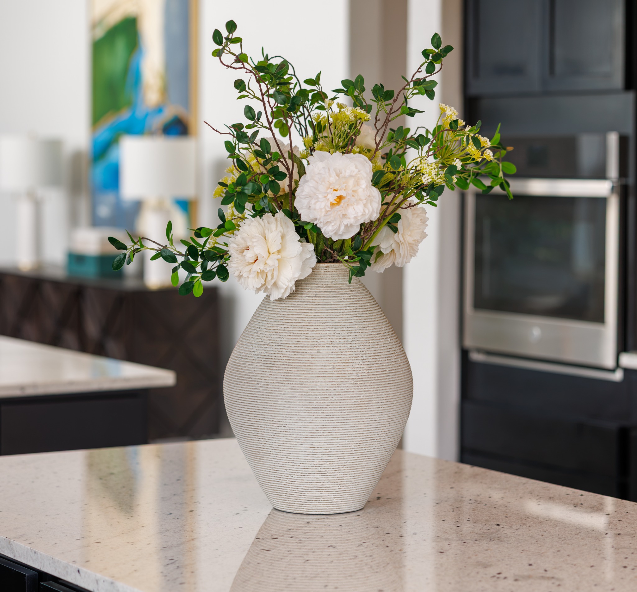 White floral arrangement on a kitchen island