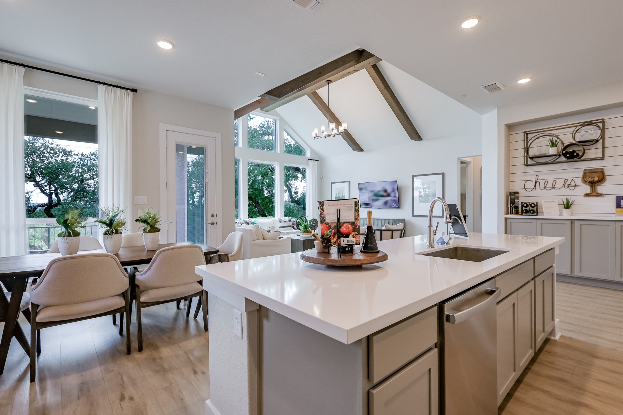 Open kitchen and dining space with vaulted ceiling